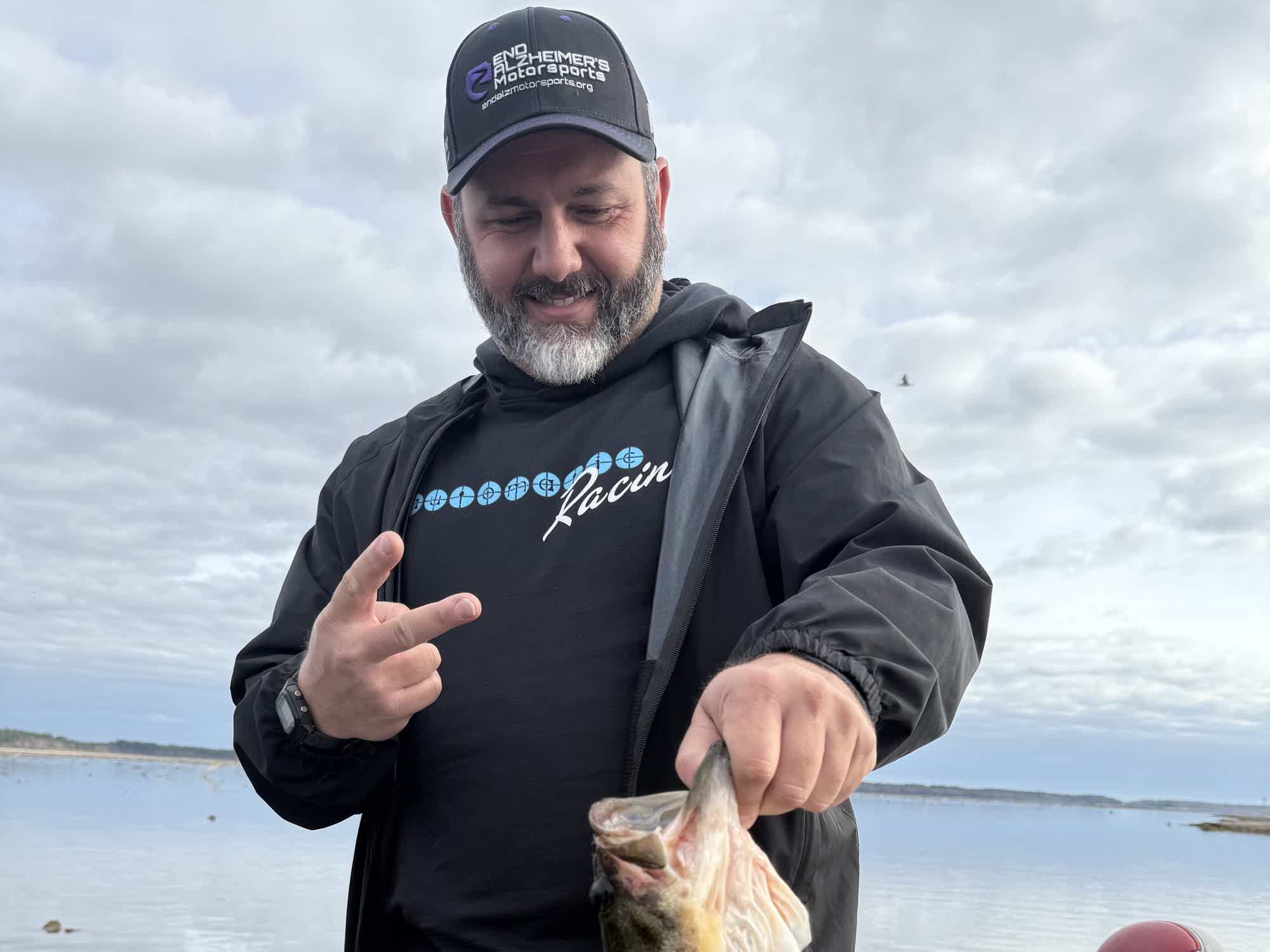 Angler with a Northeast Florida largemouth bass on the St. Johns River